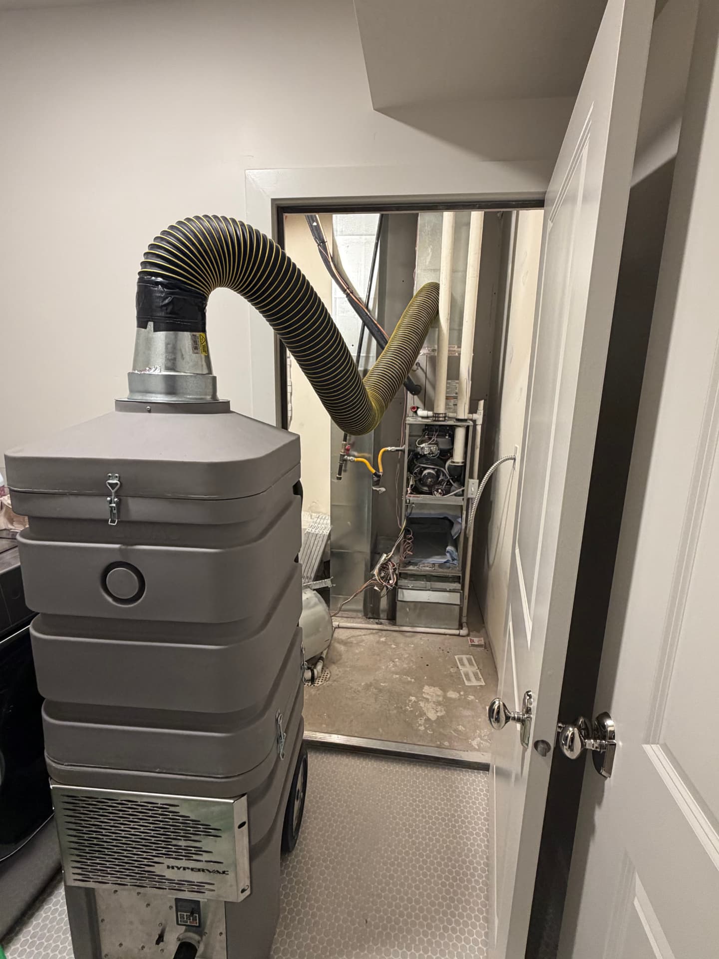 Hypervac PV099-A duct cleaning machine connected to a home HVAC system
